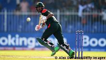 SHARJAH, UNITED ARAB EMIRATES - OCTOBER 24: Mohammad Naim of Bangladesh plays a shot during the ICC Men's T20 World Cup match between Sri Lanka and Bangladesh at Sharjah Cricket Stadium on October 24, 2021 in Sharjah, United Arab Emirates. (Photo by Alex Davidson/Getty Images)