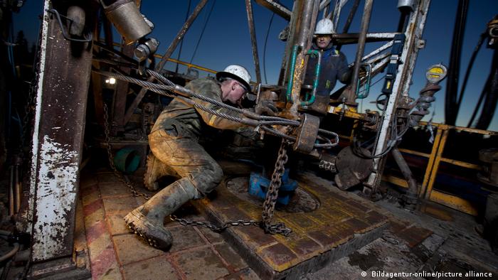 An oil worker working on an oil platform in Canada
