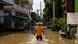 A man wades through floodwaters in a neighborhood in Ayutthaya in Thailand A man wades through floodwaters in a neighborhood in Ayutthaya in Thailand