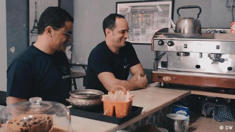 Two iCompass team members at an espresso shop in Tunis, Tunisia