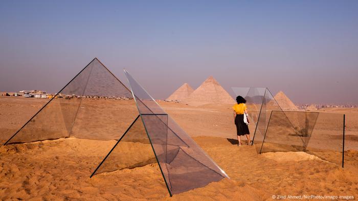 Forever Exhibition In Pyramids Visitors look at an art installation in fron pyramids in Giza, Egypt on October 25, 2021