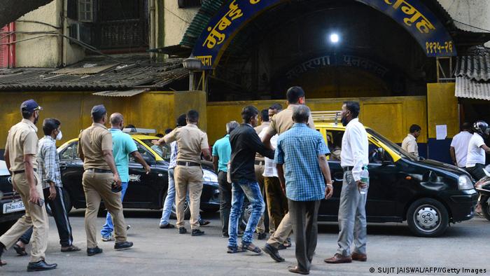 Police gather outside a jail in Mumbai