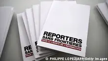 A picture taken on April 26, 2017 at the Agence France Presse (AFP) headquarters in Paris shows copies of the annual World Press Freedom Index of Reporters sans frontieres (RSF - Reporters without borders). - RSF World Press Freedom Index warned of the highly toxic media-bashing of Trump's election campaign and Britain's Brexit referendum, and said the situation was at a tipping point. (Photo by PHILIPPE LOPEZ / AFP) (Photo by PHILIPPE LOPEZ/AFP via Getty Images)