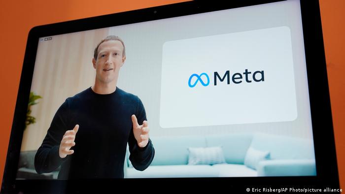 Seen on the screen of a device, Facebook CEO Mark Zuckerberg announces the company's new name, Meta.