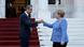 Greece's Prime Minister Kyriakos Mitsotakis, left, welcomes Germany's Chancellor Angela Merkel before their meeting at Maximos Mansion in Athens Greece's Prime Minister Kyriakos Mitsotakis, left, welcomes Germany's Chancellor Angela Merkel before their meeting at Maximos Mansion in Athens