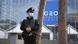 An armed police officer stands outside Rome's Palazzo dei Congressi, which will host the G20 summit An armed police officer stands outside Rome's Palazzo dei Congressi, which will host the G20 summit