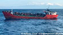 29.10.2021
This photo provided by the Hellenic Coast Guard and taken from a vessel shows a ship with migrants near the southern island of Crete, Greece, on Friday, Oct. 29, 2021. The small cargo ship with about 400 migrants on board that suffered engine problems in the eastern Mediterranean Sea off the island of Crete is being led to a safe anchorage in Greece, the Greek coast guard said Friday. (Hellenic Coast Guard via AP)