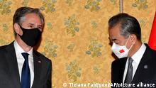 US Secretary of State Antony Blinken, left, and Chinese Foreign Minister, Wang Yi meet, Sunday, Oct. 31, 2021 at an hotel in Rome on the sidelines of the G20 of World Leaders Summit. (AP Photo/Tiziana Fabi, pool)