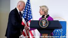 President Joe Biden and European Commission president Ursula von der Leyen shake hands after talking to reporters about pausing the trade war over steel and aluminum tariffs during the G20 leaders summit, Sunday, Oct. 31, 2021, in Rome. (AP Photo/Evan Vucci)