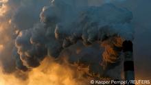 FILE PHOTO: Smoke and steam billow from Belchatow Power Station, Europe's largest coal-fired power plant, near Belchatow, Poland. Picture taken November 28, 2018. REUTERS/Kacper Pempel/File Photo