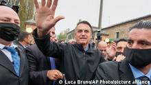 Brazil's President Jair Bolsonaro arrives in Anguillara Veneta, northern Italy, Monday, Nov. 1, 2021, where his great-great-grandfather was born and where he was recently granted honorary citizenship . The decision by the mayor of Anguillara, Alessandra Buos, has sparked protests, in particular by Italian missionaries in Brazil. (AP Photo/Luca Bruno)