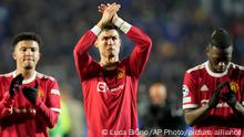 Manchester United's Cristiano Ronaldo, center, applauds the fans at the end of the Champions League group F soccer match between Atalanta and Manchester United, at the Stadio di Bergamo, in Bergamo, Italy, Tuesday, Nov. 2, 2021. The game ended in a 2-2 draw. (AP Photo/Luca Bruno)