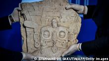 This picture taken on October 25, 2021 shows a fragment of the Mayan stela number 9 from the Piedras Negras archaeological site in Guatemala displayed prior to the handover ceremony at the Unesco headquarters in Paris. (Photo by STEPHANE DE SAKUTIN / AFP) (Photo by STEPHANE DE SAKUTIN/AFP via Getty Images)
