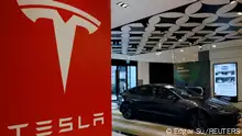 A Tesla model 3 car is seen in their showroom in Singapore October 22, 2021. Picture taken October 22, 2021. REUTERS/Edgar Su