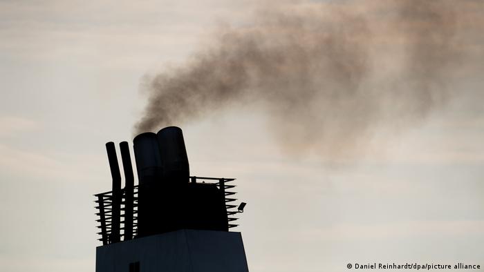 Smoke can be seen coming from a ship at a dock in Germany