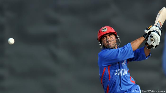 Afghanistan batsman Karim Khan Sadeq executes a powerful shot for a boundary against Pakistan