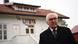 a portrait of Steinmeier in a black coat on a visit to the island a portrait of Steinmeier in a black coat on a visit to the island