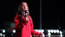 Swedish climate activist Greta Thunberg speaks on the stage of a demonstration in Glasgow, Scotland, Friday, Nov. 5, 2021 which is the host city of the COP26 U.N. Climate Summit. The protest was taking place as leaders and activists from around the world were gathering in Scotland's biggest city for the U.N. climate summit, to lay out their vision for addressing the common challenge of global warming. (AP Photo/Jon Super)