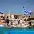 Флаг Греции на острове Халки