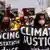 Climate activists hold up banners reading "climate justice" during a protest in Glasgow