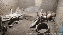 A slaves room at a Roman villa, containing beds, amphorae, ceramic pitchers and a chamber pot is discovered in a dig near the ancient Roman city of Pompeii, destroyed in 79 AD in volcanic eruption, Italy, 2021. Pompeii Archeological Park/Ministry of Cultural Heritage and Activities and Tourism/Handout via REUTERS THIS IMAGE HAS BEEN SUPPLIED BY A THIRD PARTY. NO ARCHIVE, NO RESALE