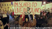 LUBLIN People protest after a death of Izabela, a 30-year-old woman in the 22nd week of pregnancy with activists saying she could still be alive if the abortion law wouldn't be so strict in Lublin, Poland November 6, 2021. Jakub Orzechowski/Agencja Wyborcza.pl via REUTERS ATTENTION EDITORS - THIS IMAGE WAS PROVIDED BY A THIRD PARTY. POLAND OUT. NO COMMERCIAL OR EDITORIAL SALES IN POLAND.