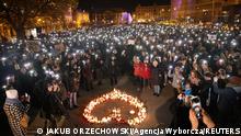 People protest after a death of Izabela, a 30-year-old woman in the 22nd week of pregnancy with activists saying she could still be alive if the abortion law wouldn't be so strict in Poznan, Poland November 6, 2021. Lukasz Cynalewski/Agencja Wyborcza.pl via REUTERS ATTENTION EDITORS - THIS IMAGE WAS PROVIDED BY A THIRD PARTY. POLAND OUT. NO COMMERCIAL OR EDITORIAL SALES IN POLAND.