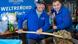 Axel Schulz and Andre Domke with a wooden shovel of herring salad Axel Schulz and Andre Domke with a wooden shovel of herring salad