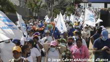 TEGUCIGALPA, HONDURAS - NOVEMBER 07: Supporters of the National Party take part during an electoral tour named the March for the Homeland, Life and Progress in Tegucigalpa, Honduras, on November 7, 2021. Honduras will hold general elections on November 28, 2021. Jorge Cabrera / Anadolu Agency