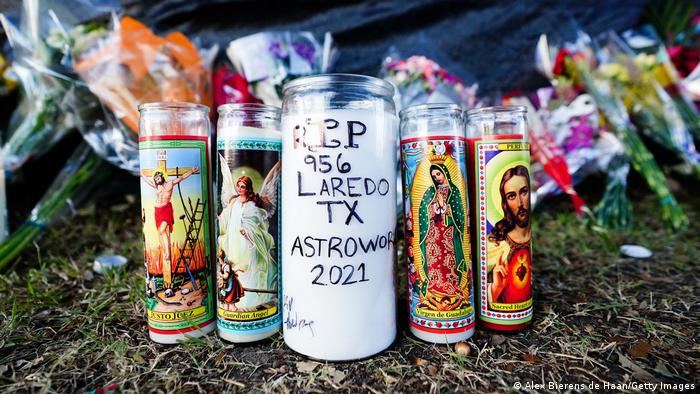 Candles are seen outside of the canceled Astroworld festival.