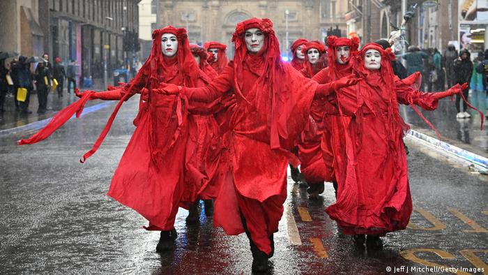 The Red Rebels walk through Glasgow