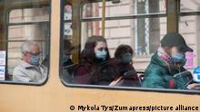 November 5, 2021, Lviv, Lvivska, Ukraine: People wearing face masks as a preventive measure against the spread of coronavirus sit in a tram. (Credit Image: © Mykola Tys/SOPA Images via ZUMA Press Wire