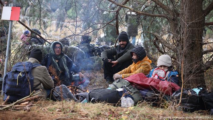 Migrants camped in a forest on Poland-Belarus border