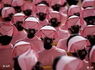 Nurses attend a ceremony marking the 30th anniversary of the founding of Shenzhen Special Economic Zone, in Shenzhen city, south Chinas Guangdong province, Monday, Sept. 6, 2010. Shenzhen was once regarded as one of China's most successful special economic zones under the economic liberalization policies championed by the late Chinese leader Deng Xiaoping. (AP Photo/Kin Cheung)