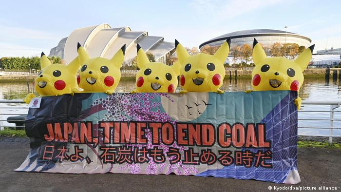 Protesters dressed as Pikachu demand an end to Japanese support for the coal industry