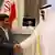محمود احمدی‌نژاد (چپ) در دیدار با شیخ حمد بن خلیفه آل ثانی، امیر قطر