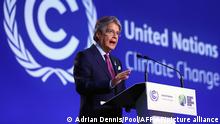 Ecuador's President Guillermo Lasso delivers his message during the UN Climate Change Conference COP26 in Glasgow, Scotland, Tuesday, Nov. 2, 2021. (Adrian Dennis/Pool Photo via AP)