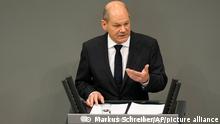 German Vice Chancellor and Finance Minister Olaf Scholz delivers his speech during a debate about the measures to battle the coronavirus and COVID-19 at the parliament Bundestag in Berlin, Germany, Thursday, Nov. 11, 2021. Germany's national disease control center reported a record-high number of more than 50,000 daily coronavirus cases on Thursday as the country's parliament was set to discuss legislation that would provide a new legal framework for coronavirus measures.(Photo/Markus Schreiber)