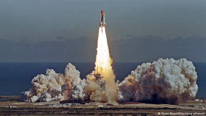 The Challenger space shuttle lifts off
