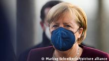 German Chancellor Angela Merkel arrives for a debate about the measures to battle the coronavirus and COVID-19 at the parliament Bundestag in Berlin, Germany, Thursday, Nov. 11, 2021. Germany's national disease control center reported a record-high number of more than 50,000 daily coronavirus cases on Thursday as the country's parliament was set to discuss legislation that would provide a new legal framework for coronavirus measures.(Photo/Markus Schreiber)