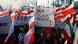 People wave flags and light flares in the colors of Poland during a march to mark Poland's Independence Day, in Warsaw, Poland People wave flags and light flares in the colors of Poland during a march to mark Poland's Independence Day, in Warsaw, Poland