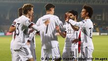 YEREVAN, ARMENIA - NOVEMBER 14: Kai Havertz of Germany celebrates with Leroy Sane and teammates after scoring their side's first goal during the 2022 FIFA World Cup Qualifier match between Armenia and Germany at Hanrapetakan Stadium on November 14, 2021 in Yerevan, . (Photo by Alexander Hassenstein/Getty Images)