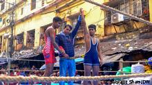 2021 Indian City Kolkata is traditionally known for its wrestling culture. A good number of traditional rings are still there on the bank of ganges. During this year wrestling society organizes a competition right on the road. 