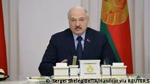 15.11.21 *** Belarusian President Alexander Lukashenko chairs a meeting with the working group on finalizing the new Constitution draft in Minsk, Belarus November 15, 2021. Sergei Sheleg/BelTA/Handout via REUTERS ATTENTION EDITORS - THIS IMAGE HAS BEEN SUPPLIED BY A THIRD PARTY. NO RESALES. NO ARCHIVES. MANDATORY CREDIT.