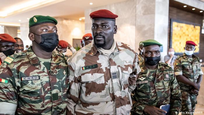 Mamady Doumbouya leaves a meeting with other members of the military junta