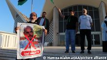 TRIPOLI, LIBYA - NOVEMBER 15: People gather to protest against the candidacy application of Saif al-Islam al-Gaddafi, the son of former Libyan ruler Muammar Gaddafi, for upcoming presidential election in Tripoli, Libya on November 15, 2021. Hamza Alahmar / Anadolu Agency