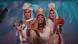 A still from the video "We Three Queens" which pictures three drag queens. A still from the video "We Three Queens" which pictures three drag queens.
