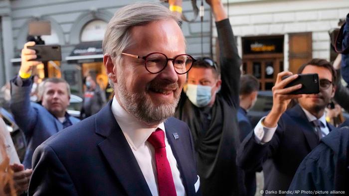 Czech Prime Minister Petr Fiala smiles at election staff in Prague