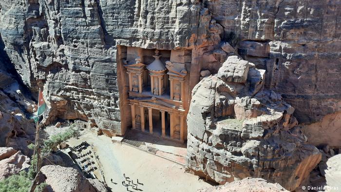 Petra Treasury building in the rock face of a gorge in Jordan.