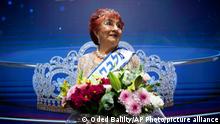 Salina Steinfeld, 86, is crowned 'Miss Holocaust Survivor' poses for a photo during a special beauty pageant honoring Holocaust survivors in Jerusalem, Tuesday, Nov. 16, 2021. Ten contestants participated in the pageant, which was held for the first time since 2019 after being suspended due to the coronavirus pandemic. (AP Photo/Oded Balilty)